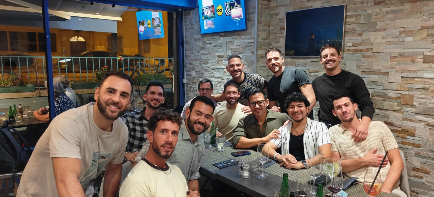 Guardians gathered around a table for a meal together